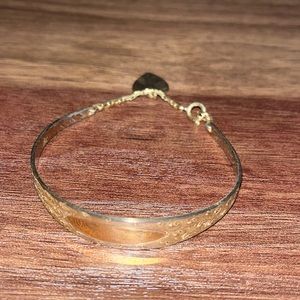 Vintage gold toned bracelet with heart charm